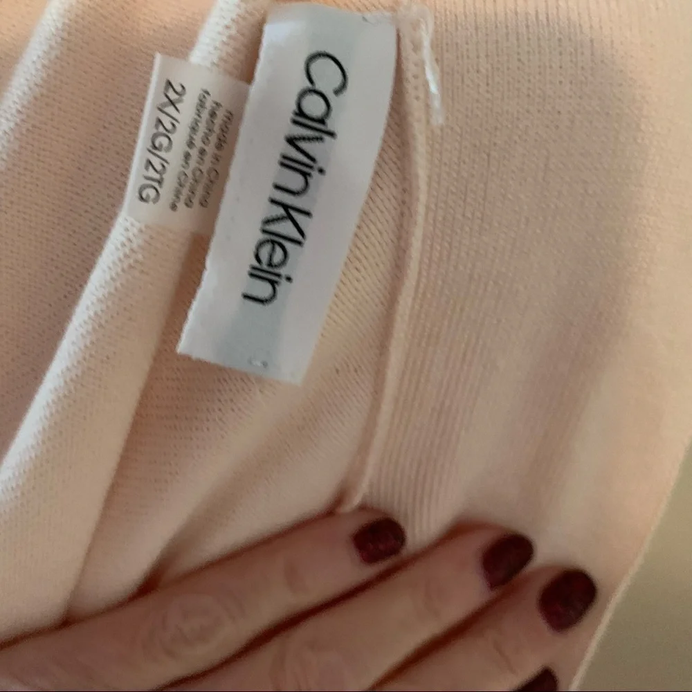 Calvin Klein NWT shrug light peach color